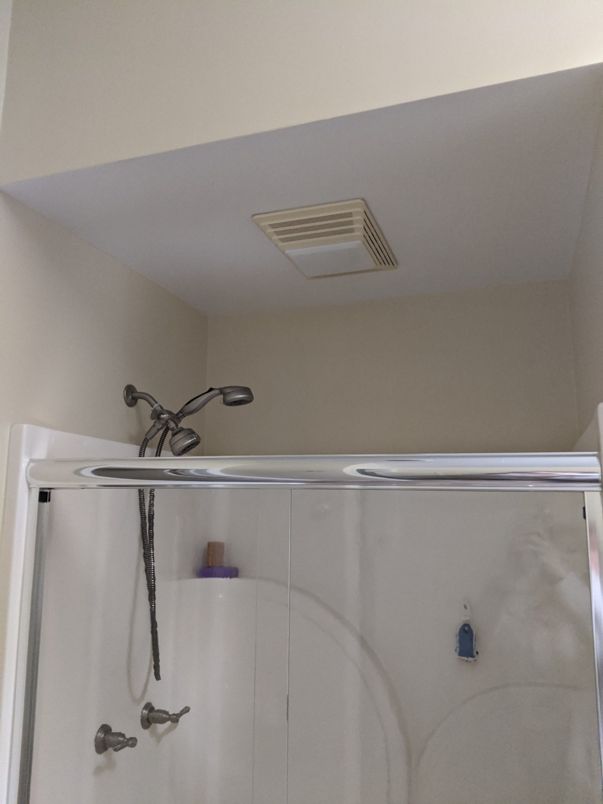 This is a before picture of a shower with just a surround