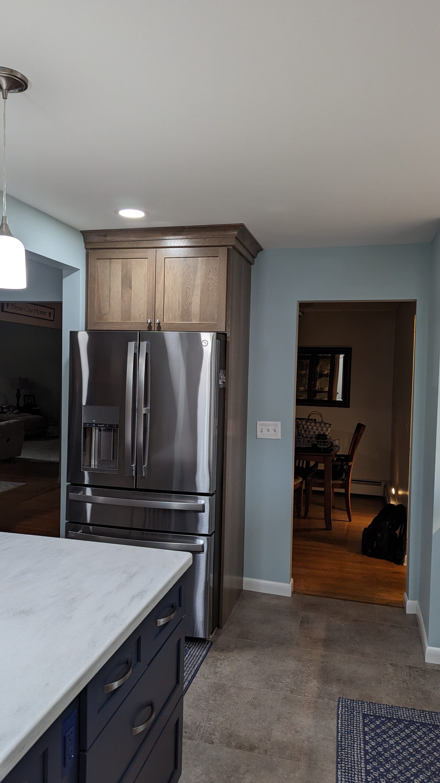 View of the new kitchen showing the refrigerator area