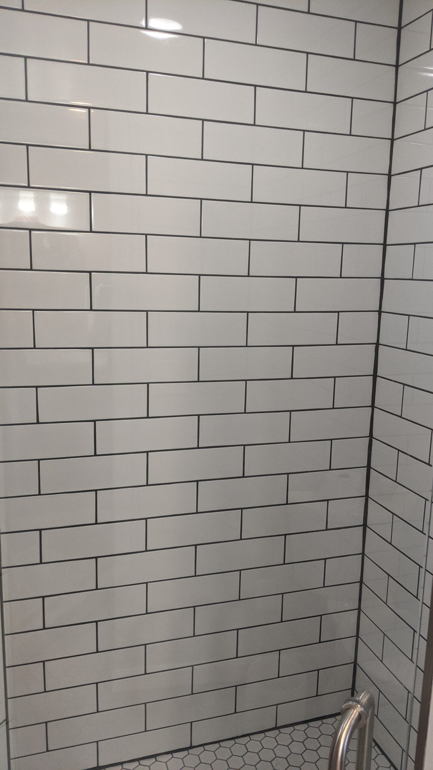 Picture of the modern subway tile shower.