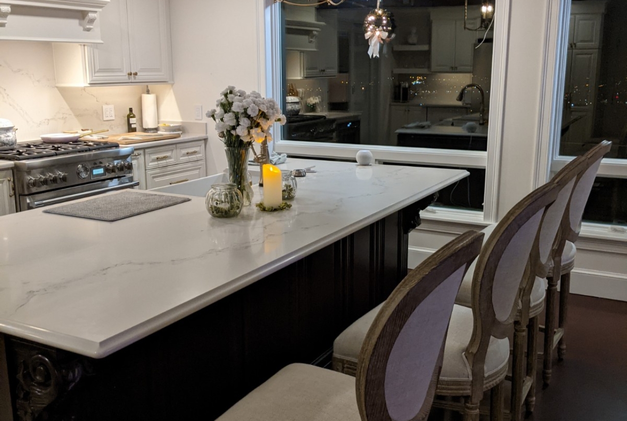 View of the new island with seating in the kitchen space.